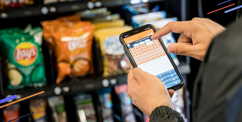 Vending operator uses the mobile app to assist stocking a vending machine.