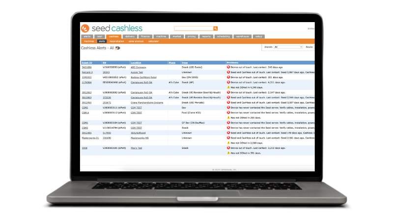A laptop with Seed Cashless+ alerts page.