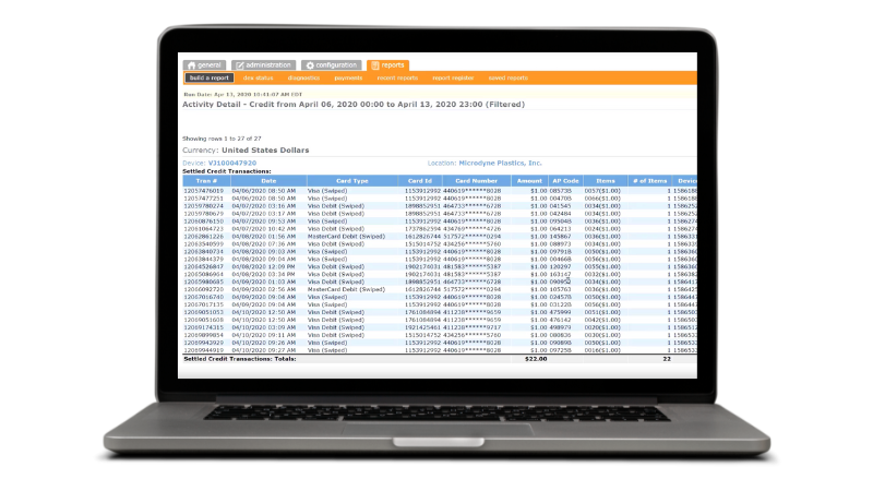 Laptop with Seed Live's card transaction list displayed.