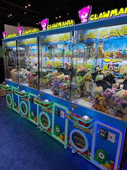Claw machines in a row with Cantaloupe's Engage Lite card readers.